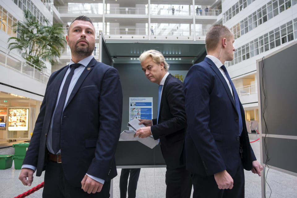 Geert Wilders, leader of the Party for Freedom, known as PVV, casts his ballot in The Hague, Netherlands, Wednesday, Nov. 22, 2023. Dutch voters cast ballots in a general election that will usher in a new prime minister for the first time in 13 years, with the rising cost of living and migration topping electoral concerns in a country that plays an important role in EU affairs and global trade and tourism.(AP Photo/Mike Corder)