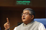 India's Information Technology Minister Ravi Shankar Prasad, addresses a press conference in New Delhi, India, Thursday, Feb. 25, 2021. India on Thursday rolled out new regulations for social media companies and digital streaming websites to make them more accountable for the online content shared on their platforms, giving the government more power to police it. (AP Photo/Manish Swarup)