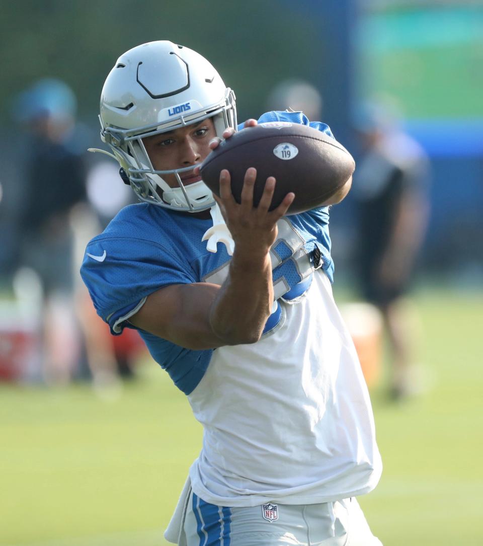 Lions wide receiver Dylan Drummond catches passes during training camp on Thursday, Aug. 3, 2023, in Allen Park.