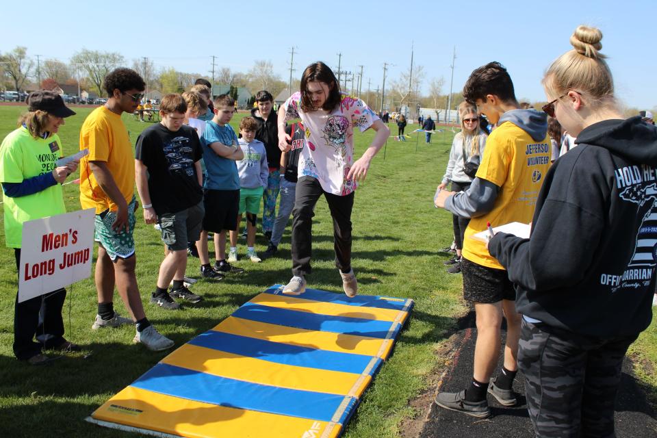 Participating in Monroe County Special Olympics for the first time, Seth Stauder, 17, competes in the men's long jump. Stauder won second place in the 14-17 age group.