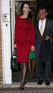 <p>This lawyer doesn’t just keep things chic on the red carpet – she’s a shining example of how workwear can also be extremely fashionable. While attending a press conference in January, she looked fashionable and professional in a red suit with velvet trim. <i>(Photo by Neil Mockford/Alex Huckle/GC Images)</i><br></p>