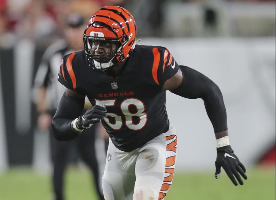 Cincinnati Bengals defensive end Joseph Ossai (58) rushes against the Tampa Bay Buccaneers in a pre-season NFL football game, Saturday, Aug. 14, 2021 in Tampa, Fla. (AP Photo/Alex Menendez)