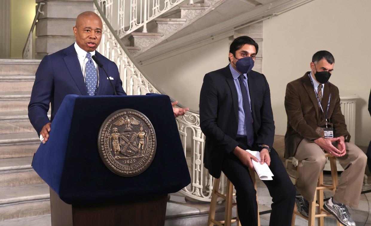 New York City Mayor Eric Adams (left) Health Commissioner Dr. Ashwin Vasan (center) and Dr. Mitchell Katz, head of the city’s public hospital network (right) at City Hall in lower Manhattan, New York.