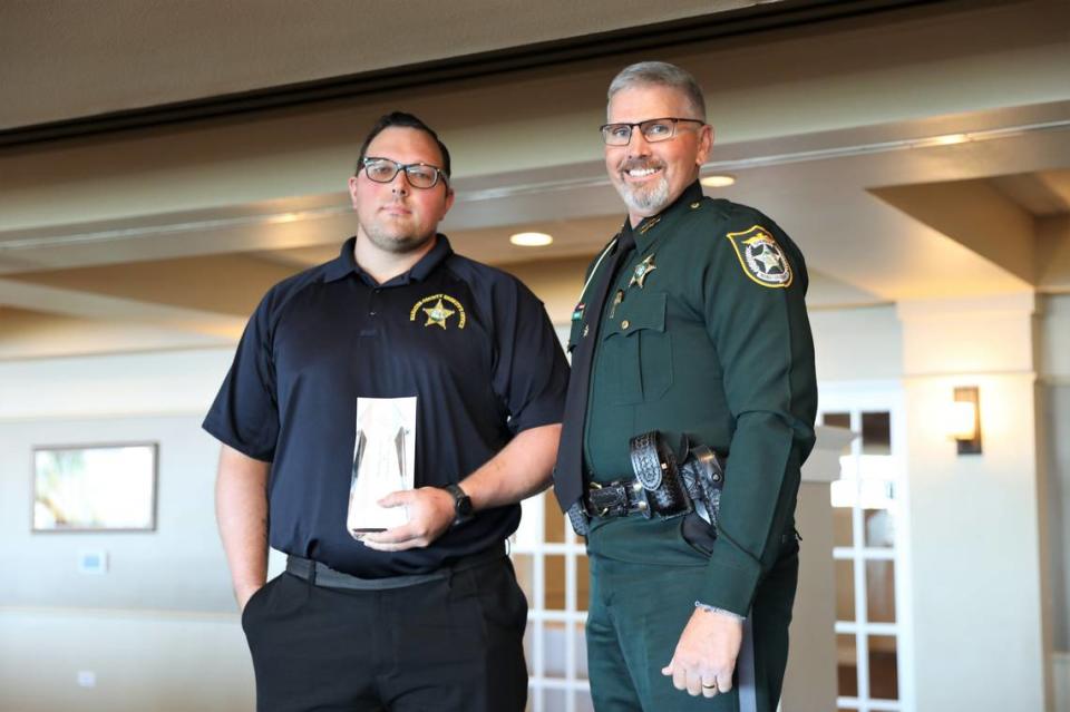 Manatee County Sheriff’s Office Employee of the Year Christopher Underwood and Sheriff Rick Wells.