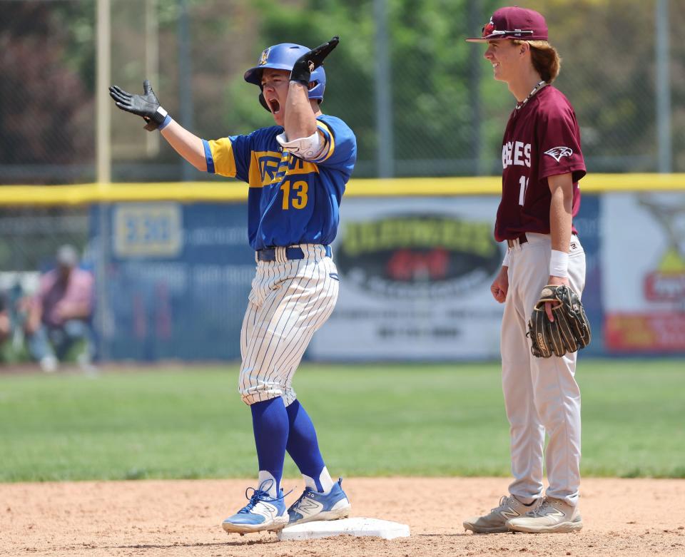 Orem’s Maddox Lamoreaux (13) celebrates a double while Maple Mountain’s Colby Warren watches during a 5A baseball super regional series in Orem on Friday, May 19, 2023. | Jeffrey D. Allred, Deseret News