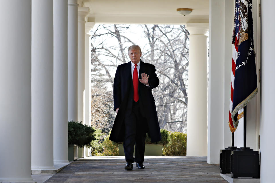 President Trump walks to the Rose Garden on Friday. (Photo: Jacquelyn Martin/AP)