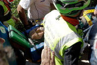 <p>A man rescued from the rubble of a building after an earthquake is pushed inside an ambulance, in Accumoli, central Italy, Wednesday, Aug. 24, 2016. A devastating earthquake rocked central Italy early Wednesday, collapsing homes on top of residents as they slept. (AP Photo/Andrew Medichini) </p>