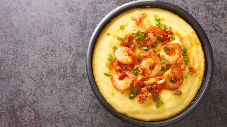 Bowl of grits with shrimp