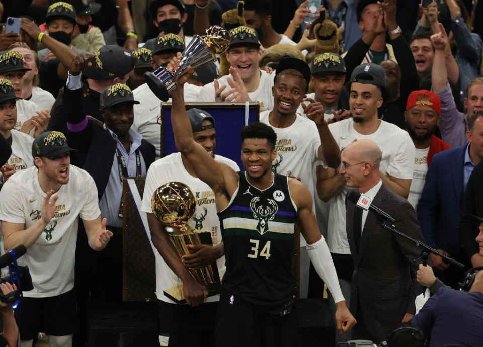 Giannis Antetokounmpo seen celebrating on Tuesday, July 20, 2021. / Credit: Jonathan Daniel/Getty