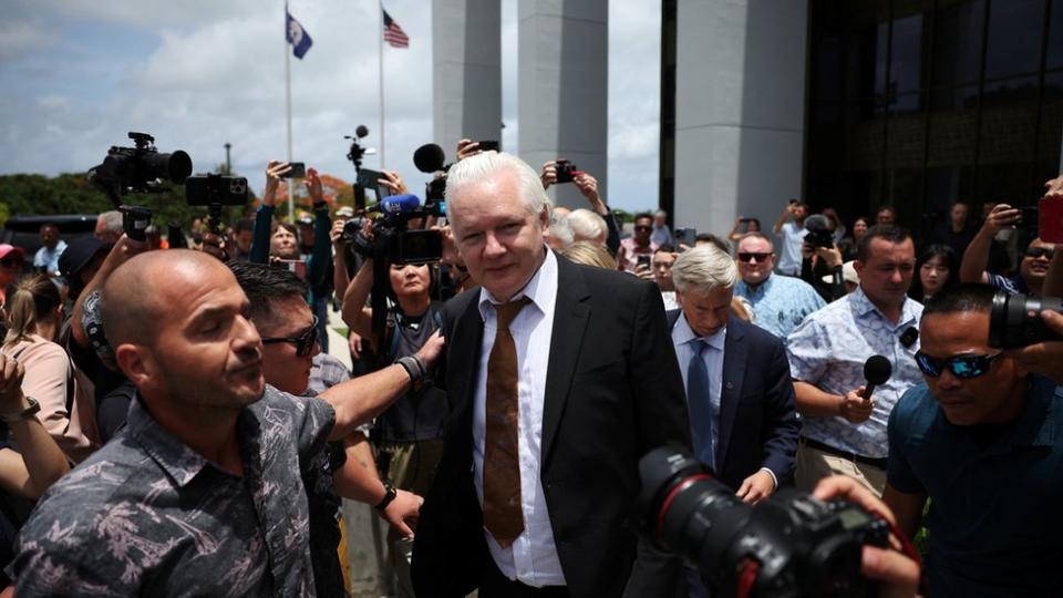 WikiLeaks founder Julian Assange makes his way as he leaves the United States District Court following a hearing, in Saipan, Northern Mariana Islands, U.S., June 26, 2024.