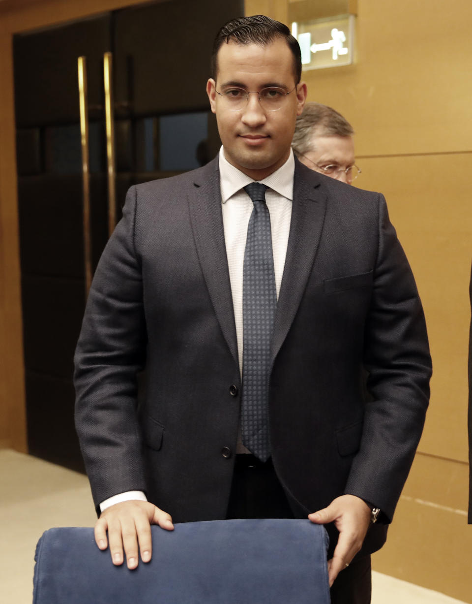 Former President Macron's security aide Alexandre Benalla appears before the French Senate Laws Commission prior to his hearing, in Paris, Monday, Jan. 21, 2019. Benalla has been taken into police custody last week in an investigation of possible misuse of diplomatic passports and then released. (AP Photo/Christophe Ena)