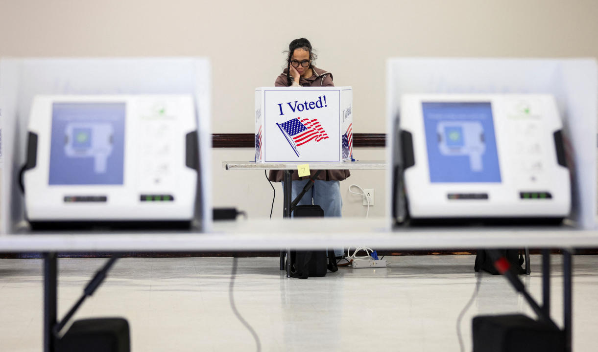 A woman votes at the Richland County Adult Activities Center in Columbia.