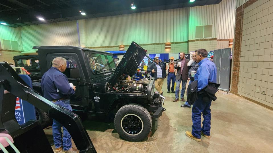 Attendees look over a Roxor utility vehicle at the 2022 IDEAg Farm and Ranch Show at the Amarillo Civic Center in this file photo.