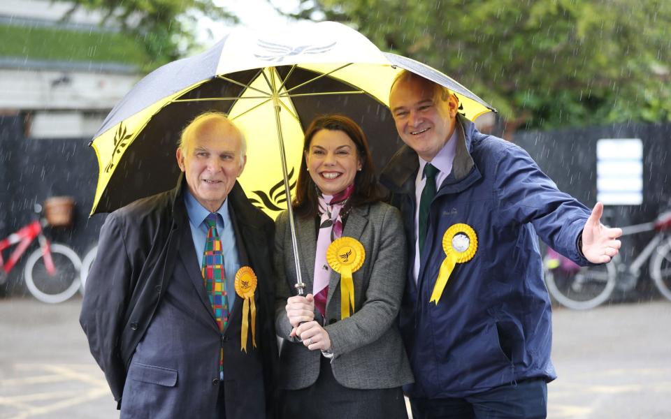 MP Sarah Olney with former cabinet ministers Sir Vince Cable (left) and Sir Ed Davey  - Credit: Jonathan Brady/PA