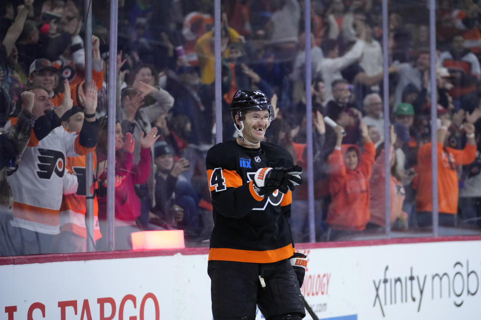 Philadelphia Flyers' Sean Couturier reacts after scoring the game-winning goal during overtime in an NHL hockey game against the Vegas Golden Knights, Saturday, Nov. 18, 2023, in Philadelphia. (AP Photo/Matt Slocum)