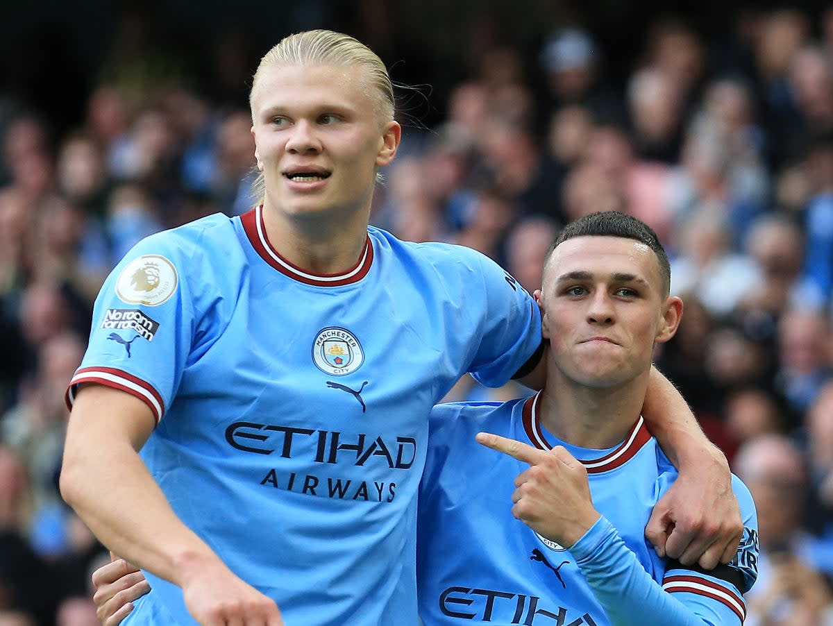 Erling Haaland and Phil Foden both scored hat-tricks for Manchester City against United (AFP via Getty Images)