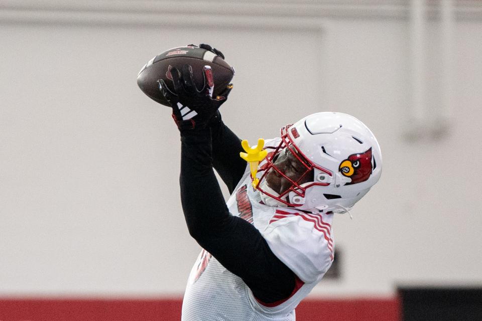 Louisville football wide receiver Chris Bell (0) runs drills during spring practice on Saturday, March 23, 2024 at the Trager practice facility in Louisville, Ky.