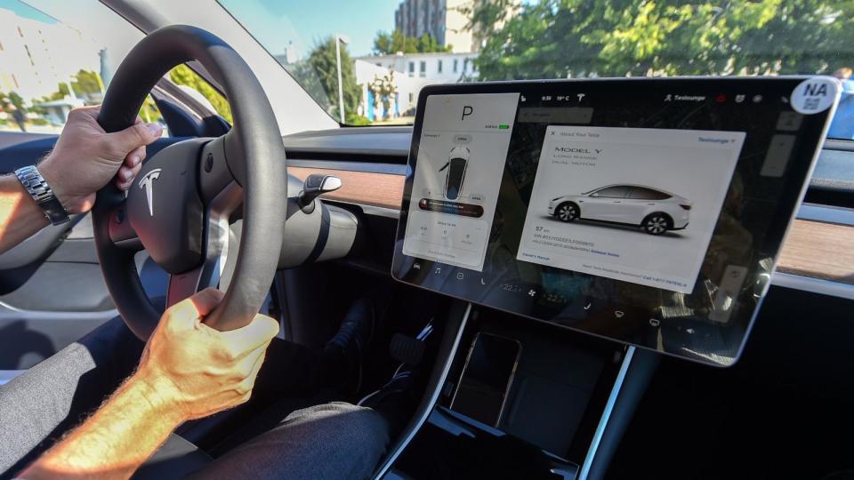 PHOTO: A driver is seen inside of a Tesla Model Y car during its presentation at the Automobile Club, Sept. 5, 2020, in Budapest, Hungary. (Attila Kisbenedek/AFP via Getty Images)