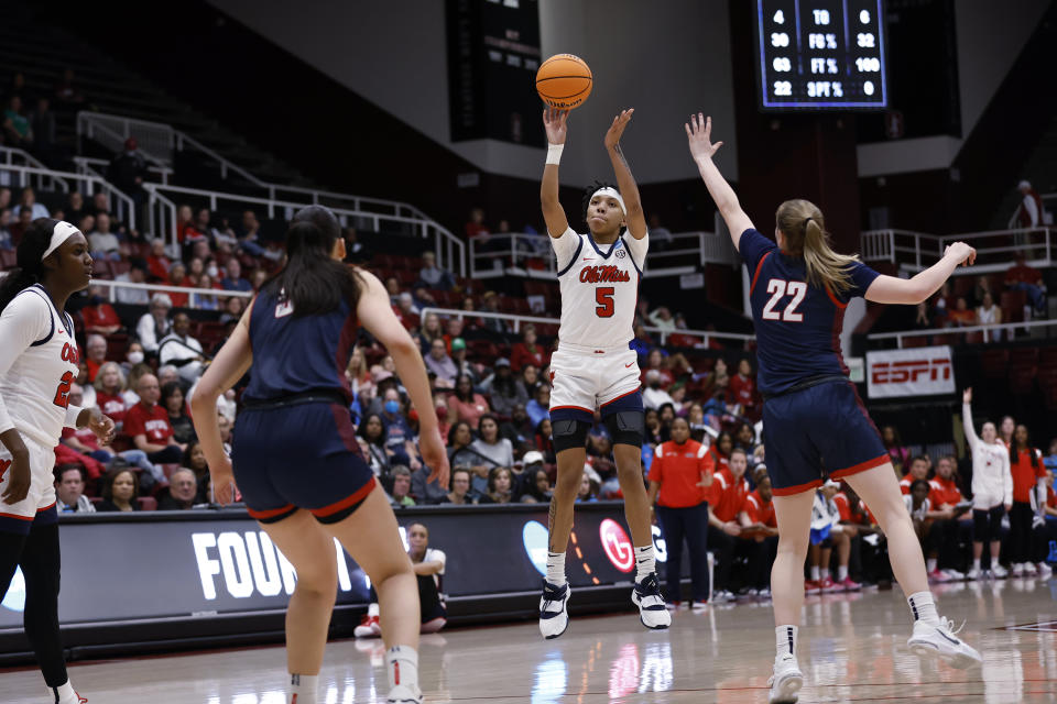 Mississippi forward Snudda Collins (5) shoots a 3-pointer against Gonzaga guard Brynna Maxwell (22) during the first half of a first-round college basketball game in the women's NCAA Tournament in Stanford, Calif., Friday, March 17, 2023. (AP Photo/Josie Lepe)