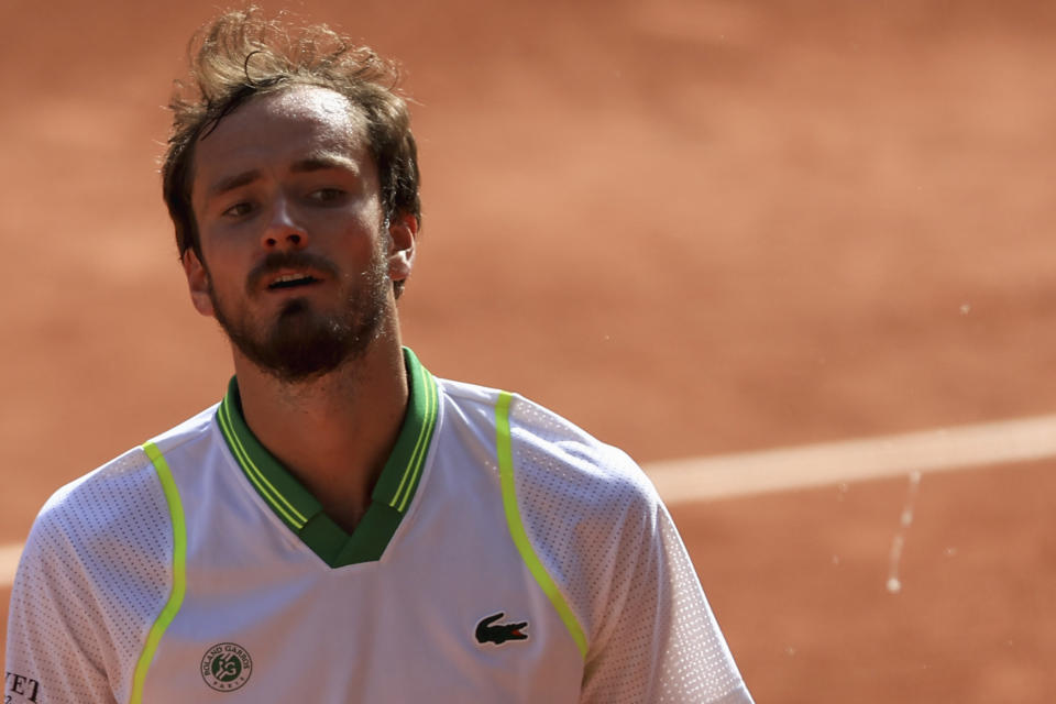 Russia's Daniil Medvedev spits as he walks off the court after losing against Brazil's Thiago Seyboth Wild during their first round match of the French Open tennis tournament at the Roland Garros stadium in Paris, Tuesday, May 30, 2023. (AP Photo/Aurelien Morissard)