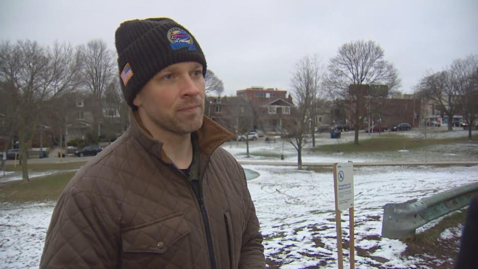 Coun. Brad Bradford, who represents Beaches East York, says he's not happy that city has banned tobogganing at 45 hills across the city. That ban includes East Lynn Park, a green space that slopes down from the Danforth near Woodbine Avenue. (CBC - image credit)