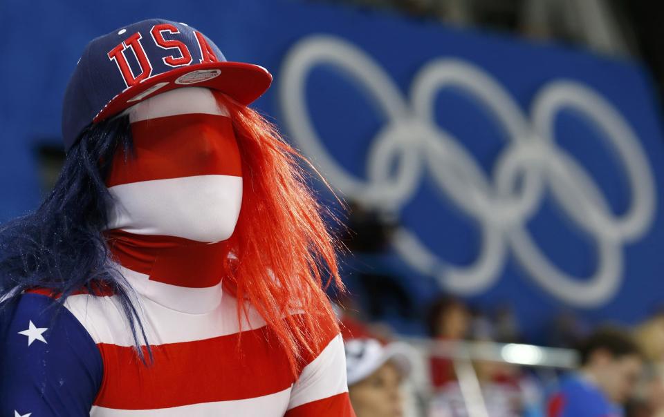 A Team USA fan awaits the start of the women's ice hockey game against Canada at the 2014 Sochi Winter Olympics