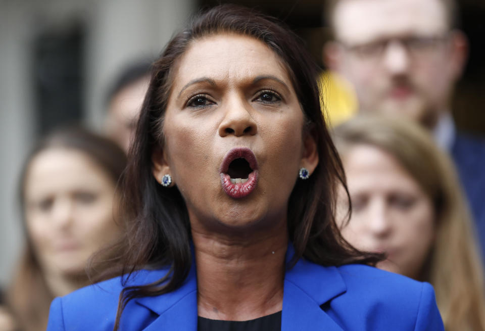 Anti-Brexit campaigner Gina Miller speaks outside the Supreme Court in London, Tuesday, Sept. 24, 2019 after it made it's decision on the legality of Prime Minister Boris Johnson's five-week suspension of Parliament. In a setback for Johnson, Britain's Supreme Court has ruled that the suspension of Parliament was illegal. The ruling Tuesday is a major blow to the prime minister who had suspended Parliament for five weeks, claiming it was a routine closure. (AP Photo/Frank Augstein)