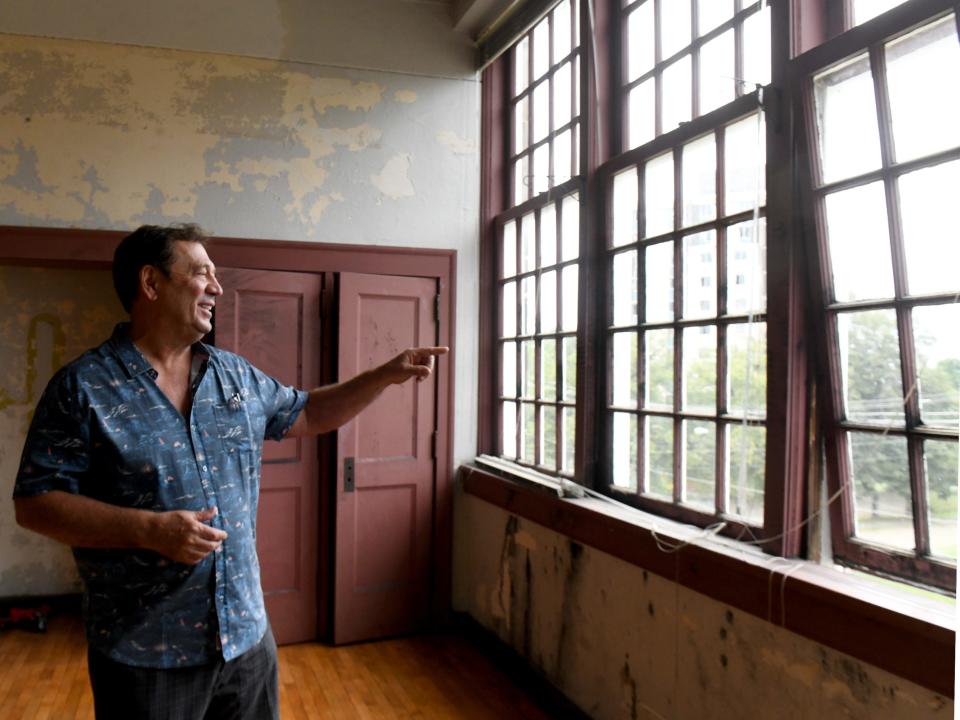 Owner Gary Gergley discusses renovations to an upper floor of the former Wells Elementary School on Wednesday, Aug. 16, 2023, in Canton.