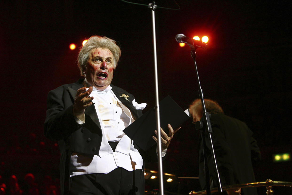 FILE - Performer Barry Humphries as Sir Les Patterson performs at the Last Night of the BBC Poms at the Royal Albert Hall, in London, Sept. 15, 2009. Tony Award-winning comedian Barry Humphries, internationally renowned for his garish stage persona Dame Edna Everage, a condescending and imperfectly-veiled snob whose evolving character has delighted audiences over seven decades, has died on Saturday, April 22, 2023, after spending several days in a Sydney hospital with complications following hip surgery, a Sydney hospital said. (Johnny Green/PA via AP, File)