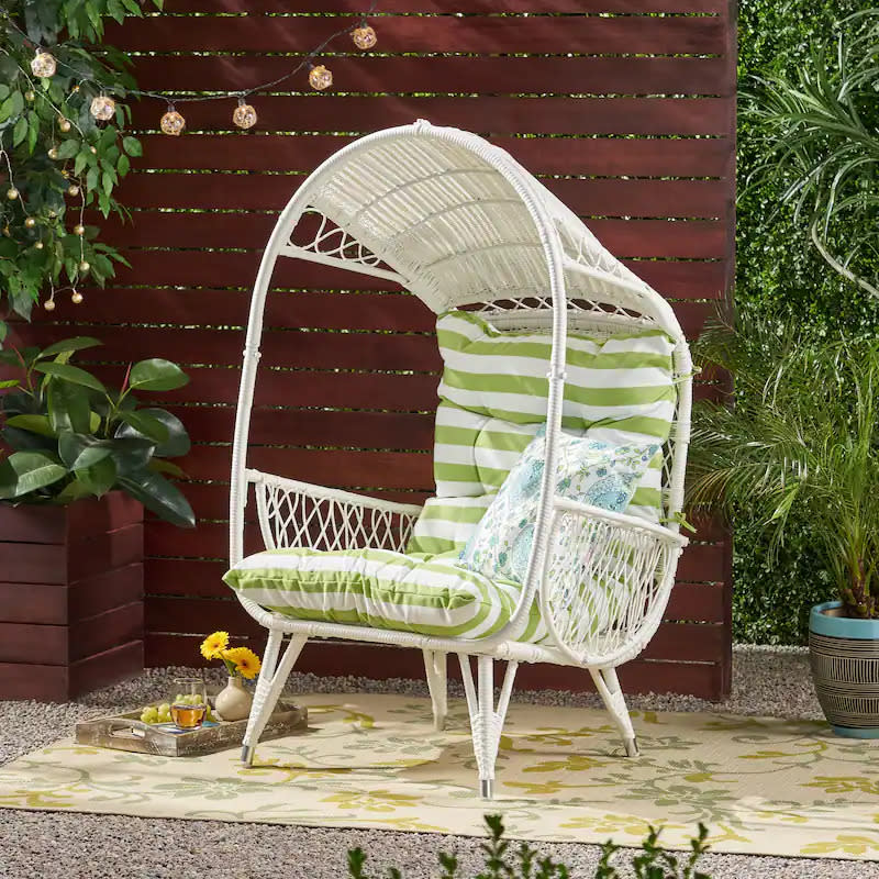 Malia Outdoor Cushioned Wicker Basket Chair. Image via Overstock.