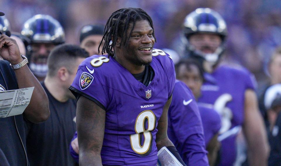 Nov 5, 2023; Baltimore, Maryland, USA; Baltimore Ravens quarterback Lamar Jackson (8) smiles on the sidelines during the fourth quarter against the Seattle Seahawks at M&T Bank Stadium. Mandatory Credit: Jessica Rapfogel-USA TODAY Sports