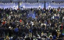 Seattle Seahawks cornerback Richard Sherman is surrounded by cameras and reporters during Media Day for Super Bowl XLVIII at the Prudential Center in Newark, New Jersey January 28, 2014. REUTERS/Carlo Allegri