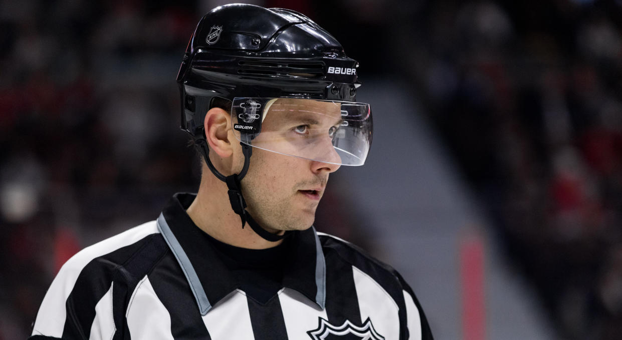 NHL linesman Kiel Murchison received a puck to the face as the Washington Capitals battled the Columbus Blue Jackets. (Getty Images)