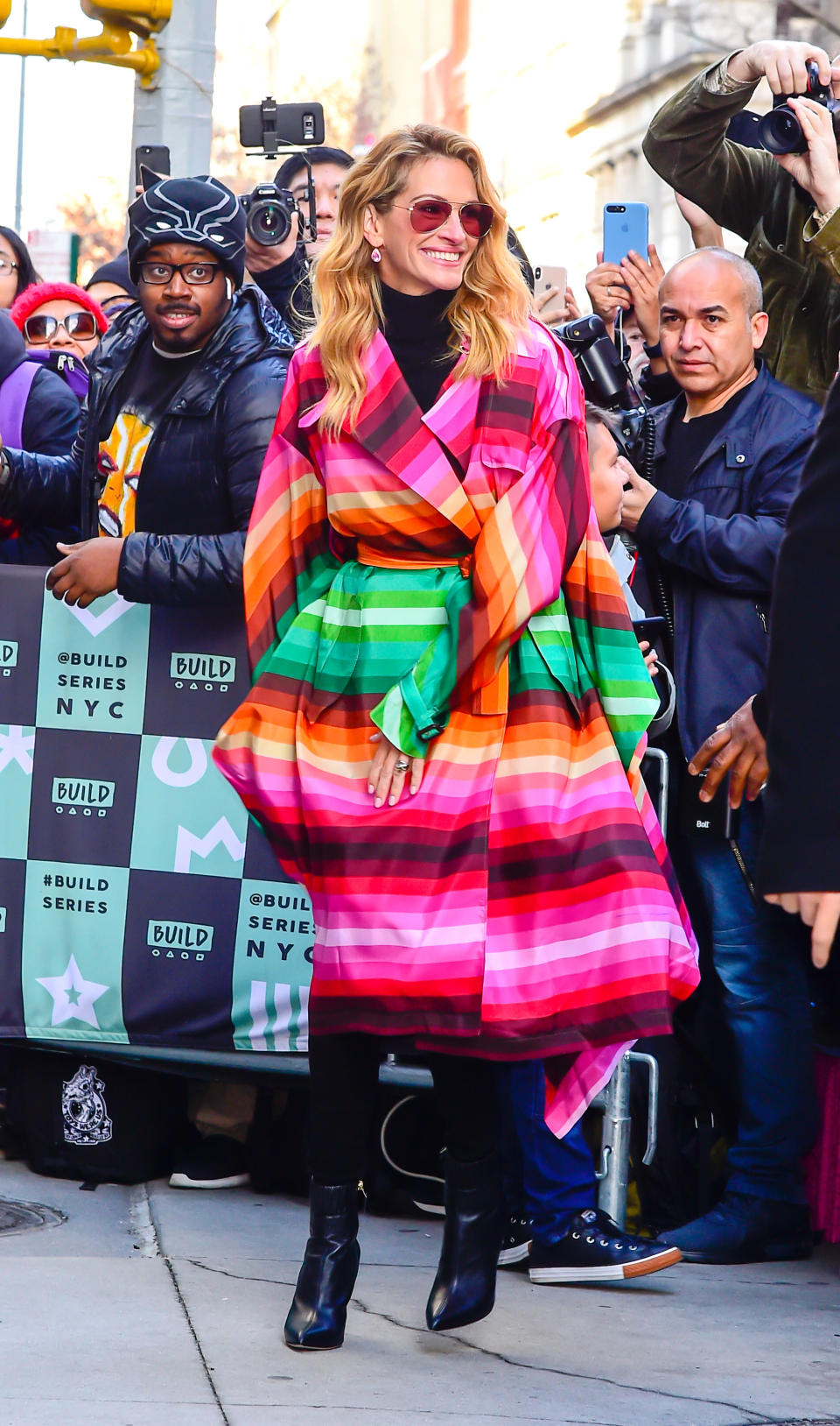 <p>The 51-year-old star proved her style game’s as strong as ever in a technicolour coat-dress from Valentino. <em>[Photo: Getty]</em> </p>