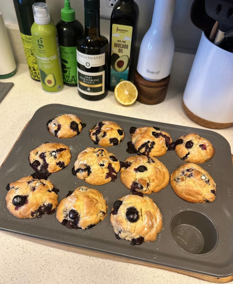 Muffin tin with blueberry muffins