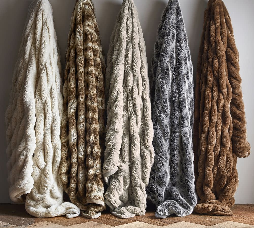 <p><a href="https://go.redirectingat.com?id=74968X1596630&url=https%3A%2F%2Fwww.potterybarn.com%2Fproducts%2Ffaux-fur-ruched-throw-collection%2F&sref=https%3A%2F%2Fwww.veranda.com%2Fshopping%2Fg42041241%2Fgifts-under-1000%2F" rel="nofollow noopener" target="_blank" data-ylk="slk:Shop Now;elm:context_link;itc:0;sec:content-canvas" class="link rapid-noclick-resp">Shop Now</a></p><p>Faux Fur Ruched Throws</p><p>potterybarn.com</p><p>$179.00</p><span class="copyright">Pottery Barn</span>