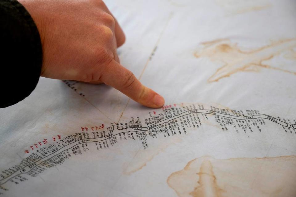 Rise Gold Corp. CEO Ben Mossman points to a map of the Idaho-Maryland Mine workings made before its 1956 closure that shows an area of particularly high gold yield.  The mine’s tunnels are now filled with water, which would have to be pumped out before mining could resume.