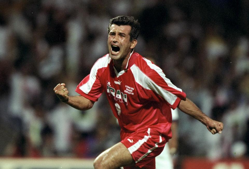 Hamid Estili of Iran in action during the World Cup first round match against the USA at the Stade Gerland in Lyon, France in 1998. Iran won the match 2-1.<span class="copyright">Ben Radford/Allsport—Getty Images</span>