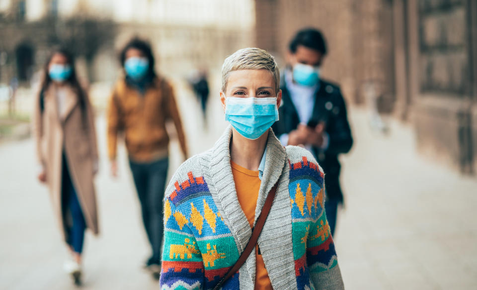 After months in isolation, the anxiety of returning to public spaces can be overwhelming. (Image via Getty Images)