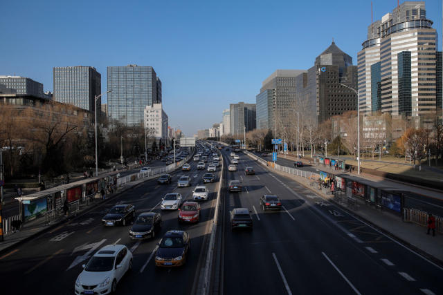 Cars on a main road in Beijing, China, on January 15, 2021, amid the coronavirus pandemic.