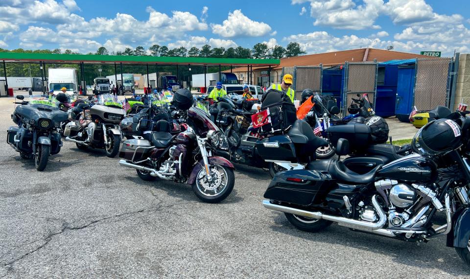 A fuel team precedes the main group of riders in the Run For The Wall from Ontario, California, to Washington, D.C., to get things ready for refueling stops such as the one May 21, 2024, at the Petro Station on West Grand Avenue in Gadsden.