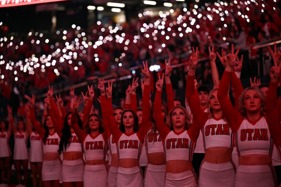 Utah Utes cheerleaders and fans stand in honor of late players Ty Jordan and Aaron Lowe as Utah and Northwestern play in the SRS Distribution Las Vegas Bowl at Allegiant Stadium on Saturday, Dec. 23, 2023. Northwestern won 14-7. | Scott G Winterton, Deseret News