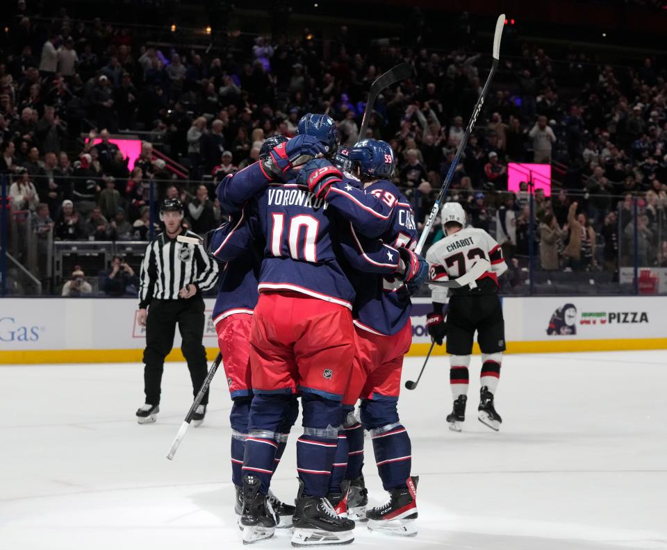 Dec. 1, 2023; Columbus, Ohio, USA; 
Columbus Blue Jackets left wing Dmitri Voronkov (10) celebrates his goal with teammates during the first period of FridayÕs hockey game against the Ottawa Senators at Nationwide Arena.