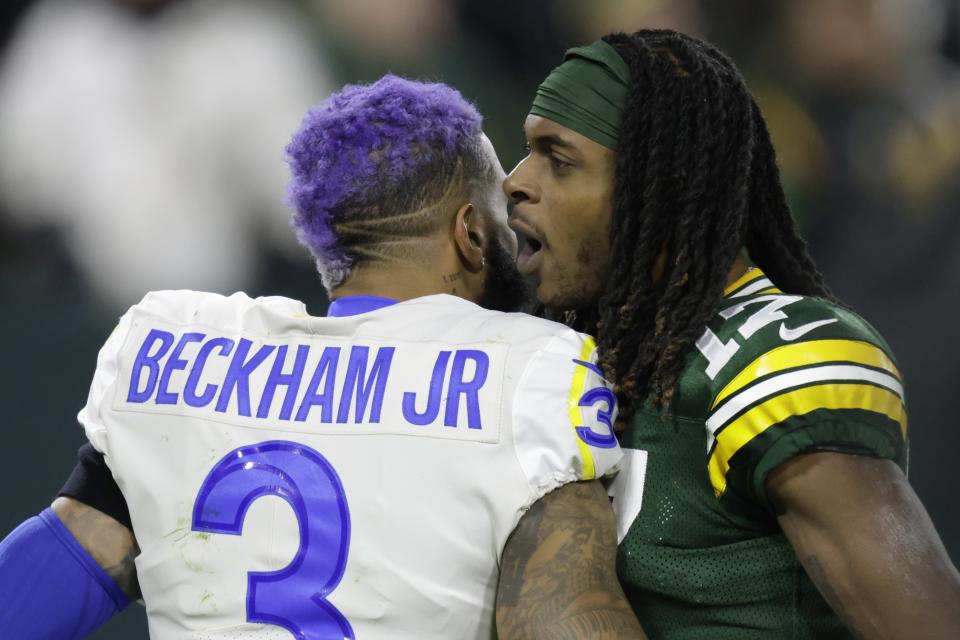 Green Bay Packers' Davante Adams talks to Los Angeles Rams' Odell Beckham Jr. after an NFL football game Sunday, Nov. 28, 2021, in Green Bay, Wis. The Packers won 36-28. (AP Photo/Matt Ludtke)