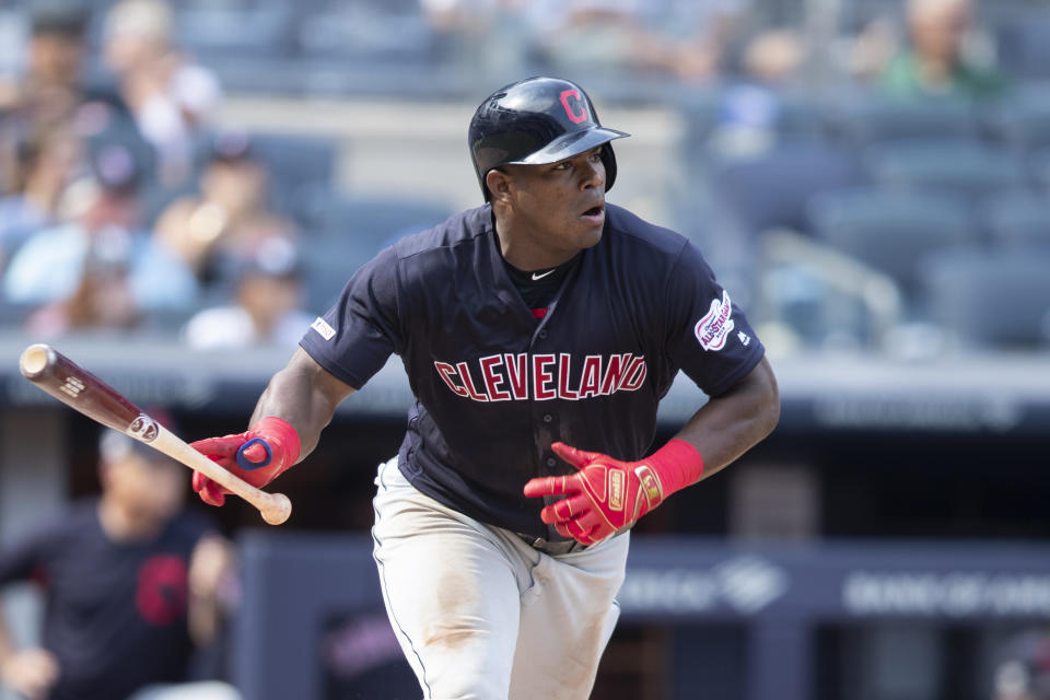 Cleveland Indians' Yasiel Puig watches the ball after hitting a double during the eighth inning of a baseball game, Saturday, Aug. 17, 2019, in New York. (AP Photo/Mary Altaffer)