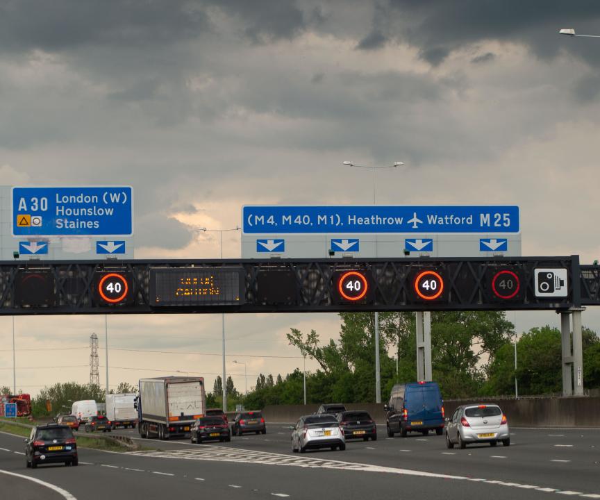 Surrey, UK. 18th May, 2024. It was a busy rush hour on the M25 Motorway in Surrey with speed restrictions in place due to various accidents. There are calls for Smart Motorways to be scrapped due to safety concerns and the number of deaths caused on them. A year ago Prime Minister Rishi Sunak, cancelled the roll out of any further Smart Motorway upgrades pending a safety review. Credit: Maureen McLean/Alamy