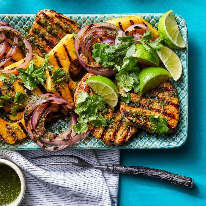 <p>Never grilled pineapple? Get ready to be wowed. It caramelizes beautifully for a deeper flavor. Plus it's a totally tasty match with a grilled pork chop, cilantro and a little heat from serranos. <a href="https://www.eatingwell.com/recipe/279026/grilled-pork-chops-with-chile-pineapple/" rel="nofollow noopener" target="_blank" data-ylk="slk:View Recipe" class="link ">View Recipe</a></p>