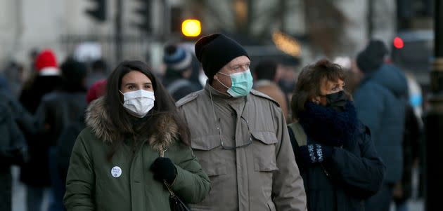 People wearing masks around London shortly after the Omicron variant was found in the capital (Photo: Anadolu Agency via Getty Images)