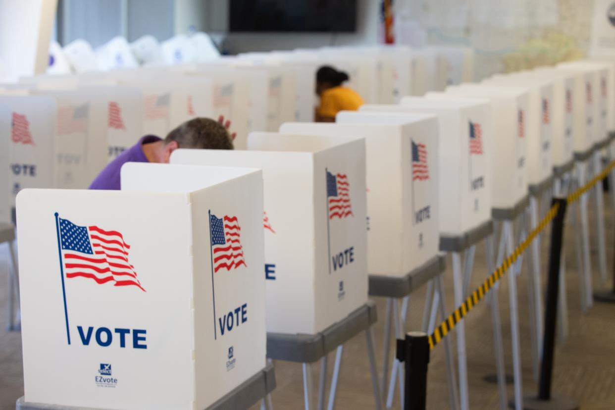 Lines of privacy voting boxes give Shawnee County residents plenty of room to cast their ballot early Monday morning at the election office, 3420 S.W. Van Buren St.