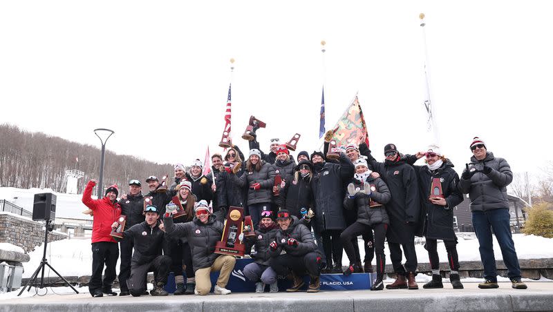 The Utah ski team celebrates its national championship at the Division I Men’s and Women’s Skiing Championships held at Mt Van Hoevenberg on March 11, 2023 in North Elba, New York.